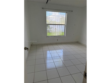 Beautiful lakefront first-floor condo in a desirable 5-story