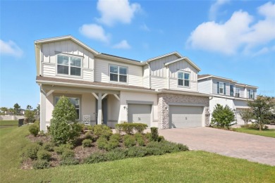 Live the Lake Nona waterfront lifestyle in this move-in-ready
