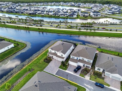 Live the Lake Nona waterfront lifestyle in this move-in-ready