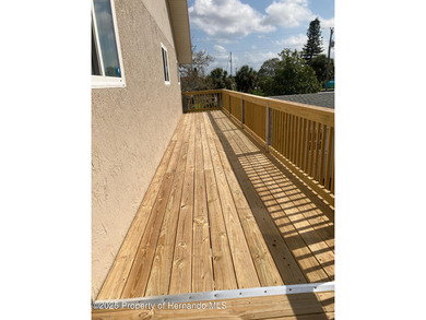 Welcome to your coastal escape in Hudson Beach Estates! This