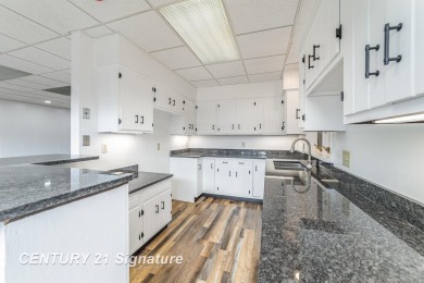 Welcome to 10363 Lakewood Dr., a beautiful and private retreat