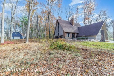 Welcome to 10363 Lakewood Dr., a beautiful and private retreat