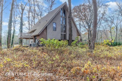 Welcome to 10363 Lakewood Dr., a beautiful and private retreat