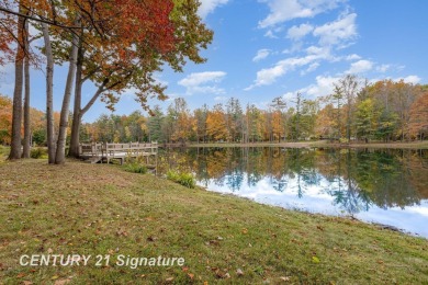 Welcome to 10363 Lakewood Dr., a beautiful and private retreat