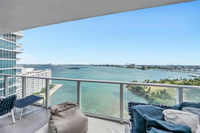 Experience refined waterfront living in this expansive unit