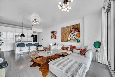 Experience refined waterfront living in this expansive unit