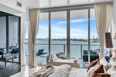Experience refined waterfront living in this expansive unit