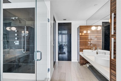 Experience refined waterfront living in this expansive unit