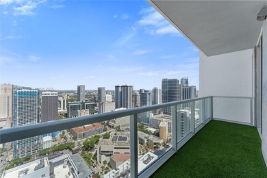 Spacious 2B/2B unit with floor-to-ceiling windows and two