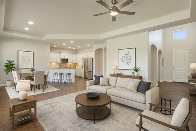 Enjoy tranquil golf course living and sweeping views from this