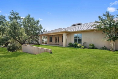 Enjoy tranquil golf course living and sweeping views from this