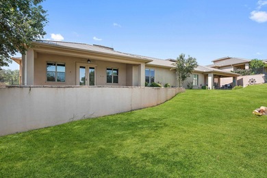 Enjoy tranquil golf course living and sweeping views from this