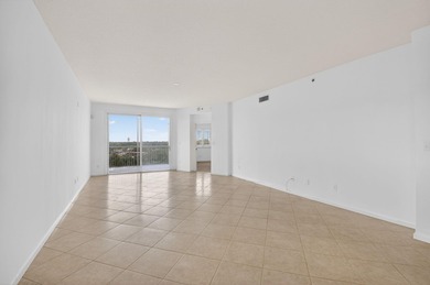 TOP floor CORNER Penthouse w/PRIVATE GARAGE & miles of VIEWS at