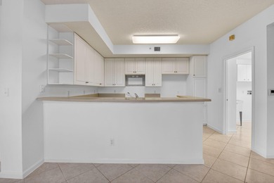 TOP floor CORNER Penthouse w/PRIVATE GARAGE & miles of VIEWS at