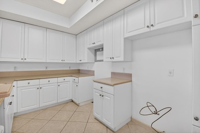 TOP floor CORNER Penthouse w/PRIVATE GARAGE & miles of VIEWS at