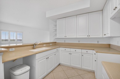 TOP floor CORNER Penthouse w/PRIVATE GARAGE & miles of VIEWS at