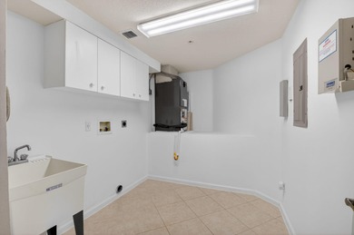 TOP floor CORNER Penthouse w/PRIVATE GARAGE & miles of VIEWS at