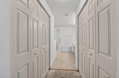 TOP floor CORNER Penthouse w/PRIVATE GARAGE & miles of VIEWS at