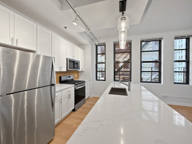 Live in the middle of it all! Walk to work, shopping