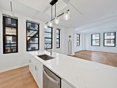 Live in the middle of it all! Walk to work, shopping