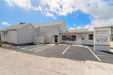 Prime commercial opportunity in the heart of Holly Hill! This 7