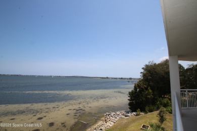 Absolutely pristine corner END UNIT direct Riverfront condo