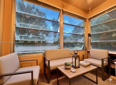 Just footsteps from the pool, this beautiful corner unit