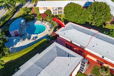 Just footsteps from the pool, this beautiful corner unit