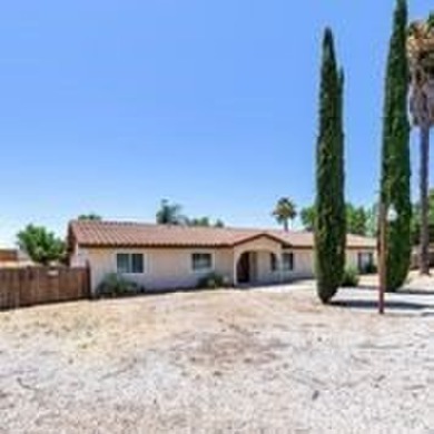 This flat 3.10 acres runs adjacent to the North bound 15 FRWY