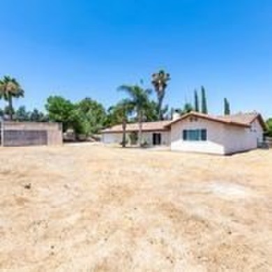 This flat 3.10 acres runs adjacent to the North bound 15 FRWY