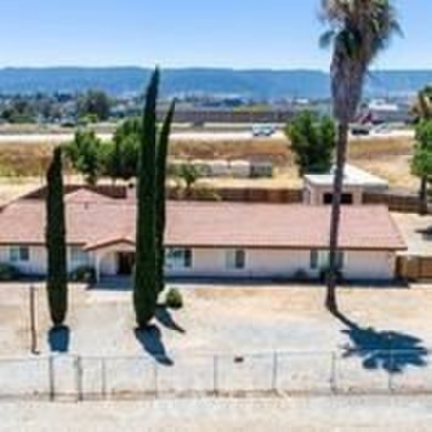 This flat 3.10 acres runs adjacent to the North bound 15 FRWY