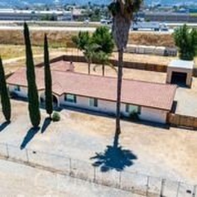 This flat 3.10 acres runs adjacent to the North bound 15 FRWY