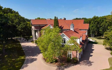 Discover unparalleled luxury at Blue Heron Estate, a stunning 9