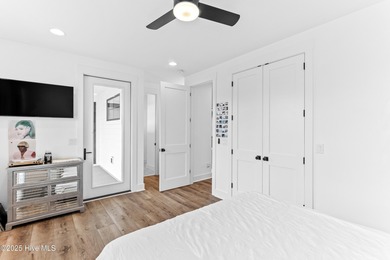 Imagine gliding home along River Road at golden hour, the Cape