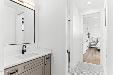 Imagine gliding home along River Road at golden hour, the Cape