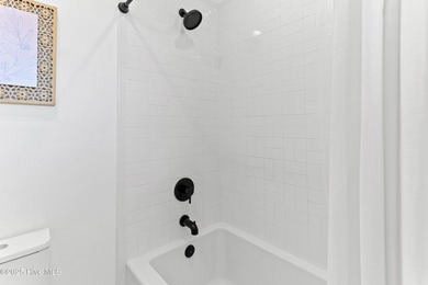 Imagine gliding home along River Road at golden hour, the Cape