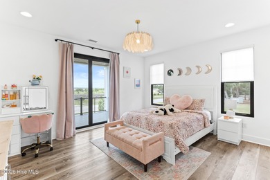 Imagine gliding home along River Road at golden hour, the Cape