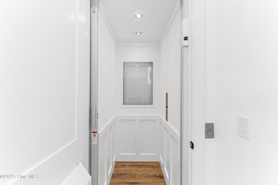 Imagine gliding home along River Road at golden hour, the Cape