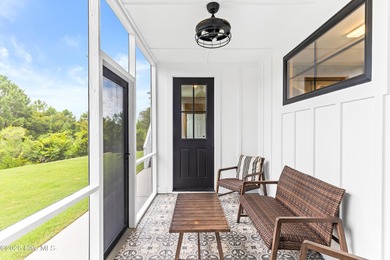 Imagine gliding home along River Road at golden hour, the Cape