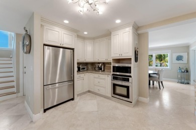 Stunning 4-Story Mediterranean Estate in Exclusive Stirrup Key -