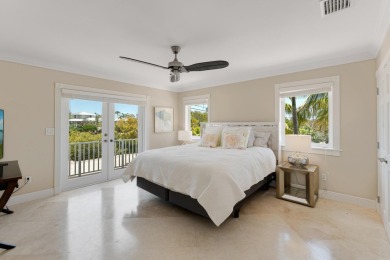 Stunning 4-Story Mediterranean Estate in Exclusive Stirrup Key -