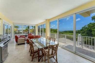 Stunning 4-Story Mediterranean Estate in Exclusive Stirrup Key -