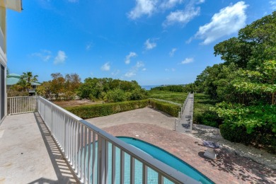 Stunning 4-Story Mediterranean Estate in Exclusive Stirrup Key -