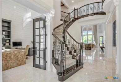 Set on a rare double lot overlooking the scenic Avery Ranch Golf