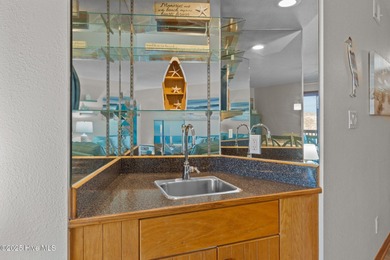 This luxury oceanfront condo at Heron Cove offers the perfect