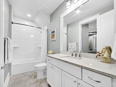 Experience luxury coastal living in this stunning Kelly