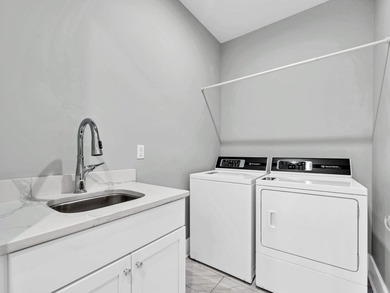 Experience luxury coastal living in this stunning Kelly