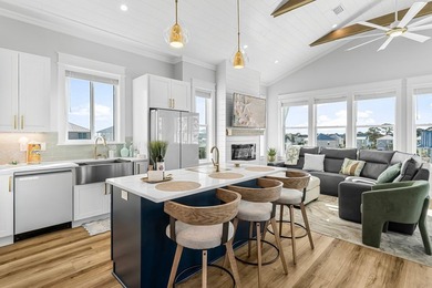 This stunning custom coastal residence delivers the ultimate