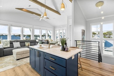 This stunning custom coastal residence delivers the ultimate