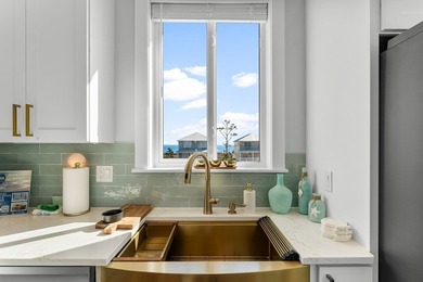 This stunning custom coastal residence delivers the ultimate